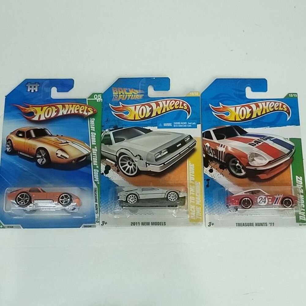 Lot of 3 Hot Wheels Shelby Cooper Daytona Delorean Datsun 24oz NEW Die Cast
